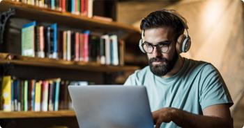 Man Typing on Computer