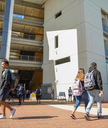 Students Walking Outside a Building