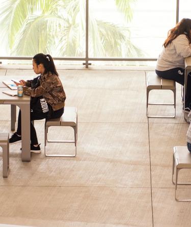 Students Sitting on Cafeteria
