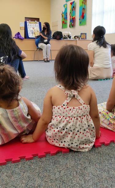 Children sitting on the floor at storytime