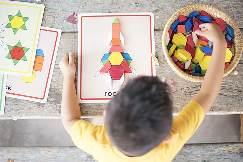 Kid Solving Puzzle