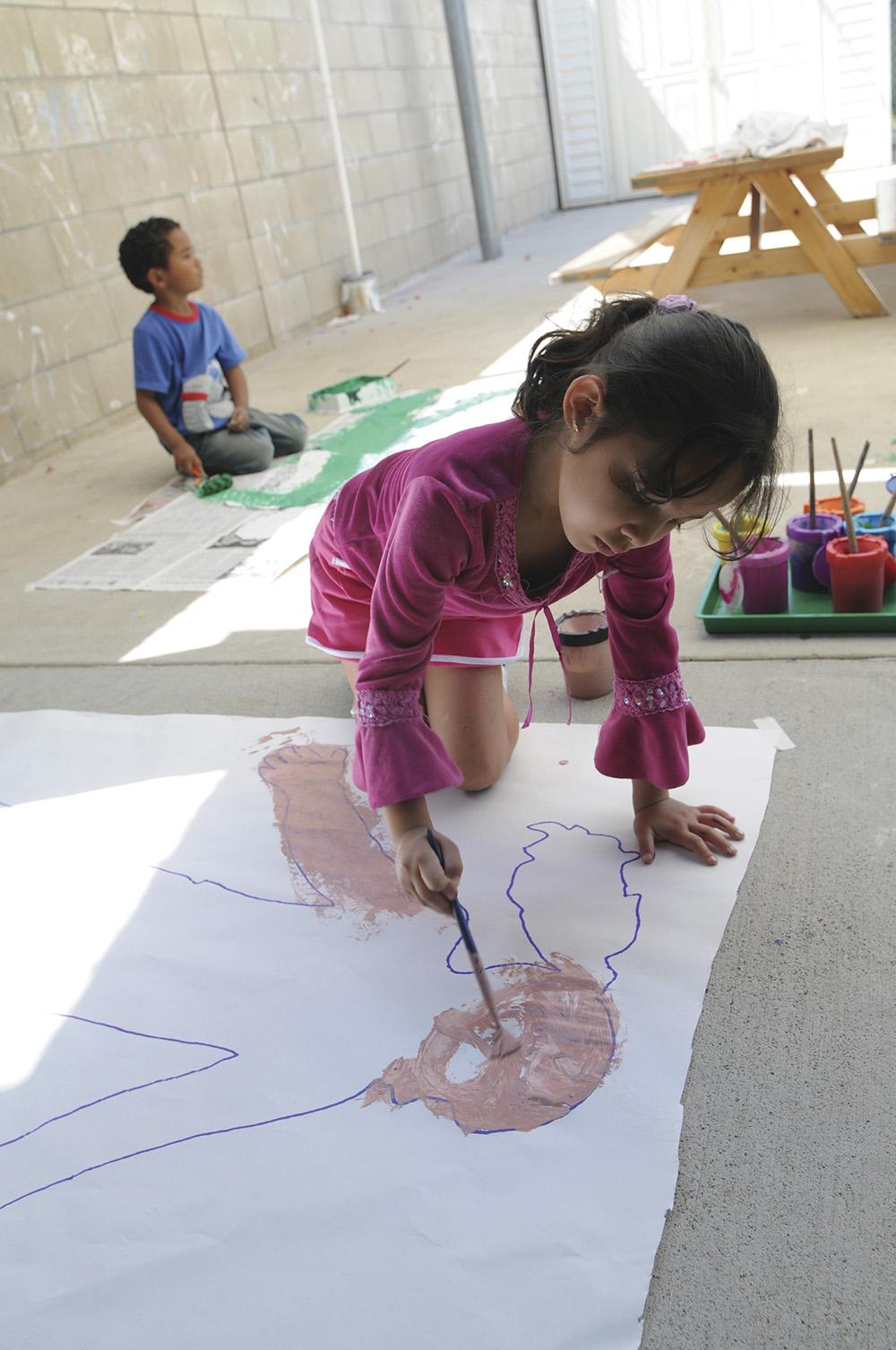Kid Drawing on the Floor