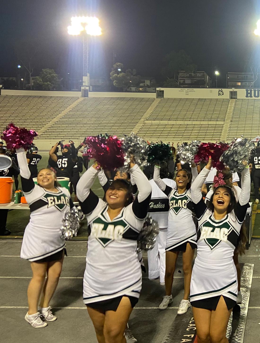 ELAC Cheerleaders cheering at football game