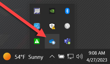 click on the system tray and then click on the OneDrive icon