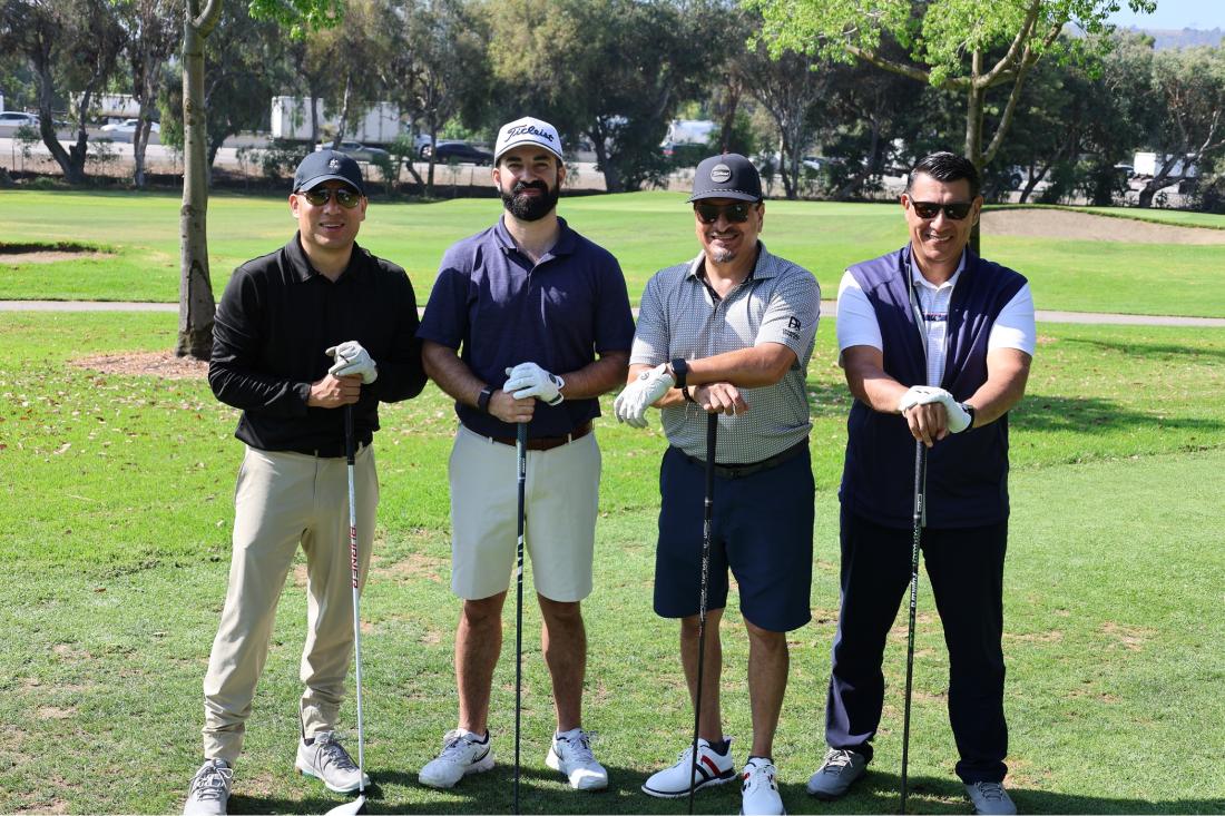 Golfers stand on the course during the 2025 ELAC Alumni Golf Tournament