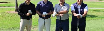 Group of golfers stand on the course during the 2025 ELAC Alumni Association Golf Tournament