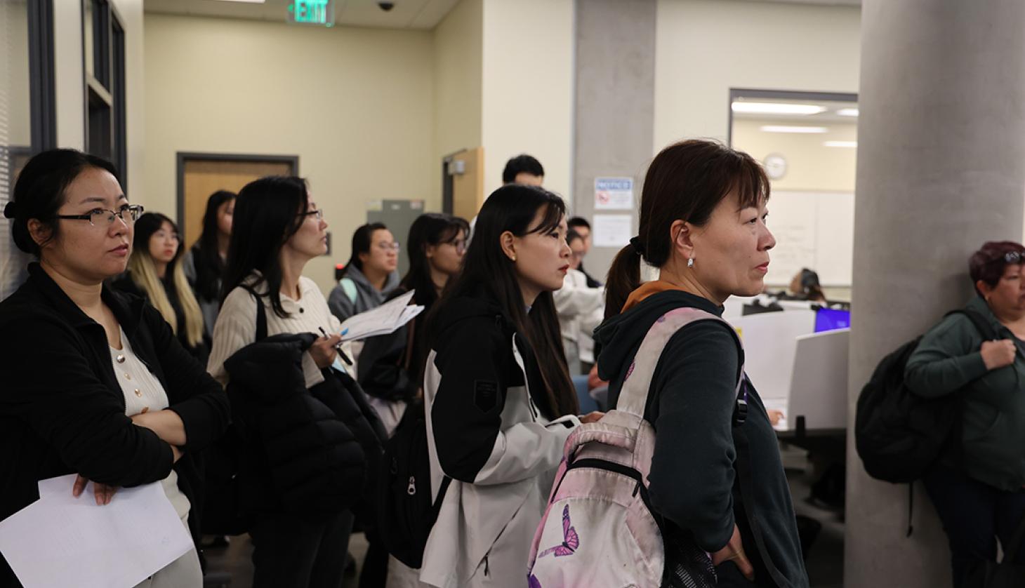 Students watching a presentation.