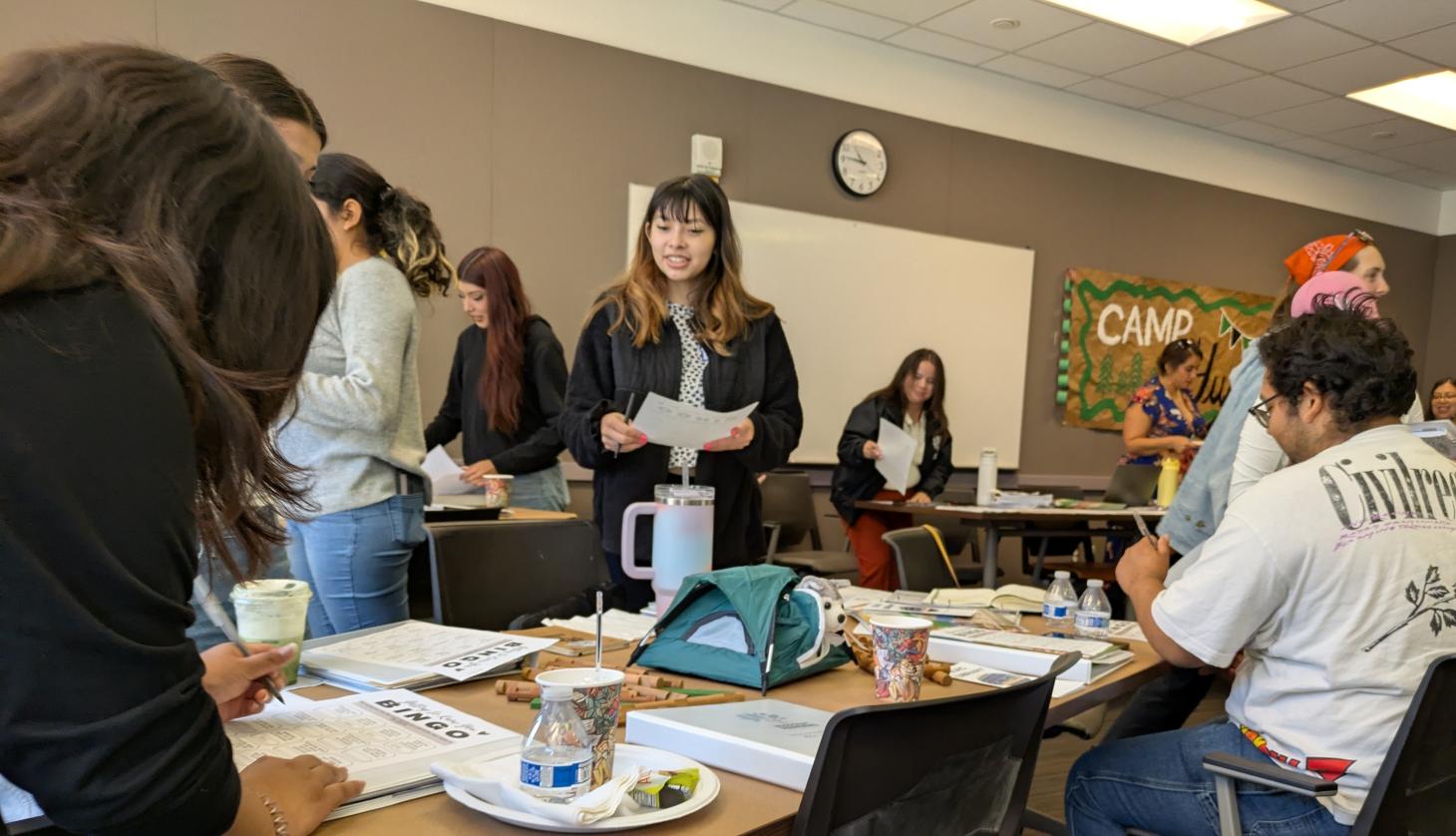 Students walk around doing an activity