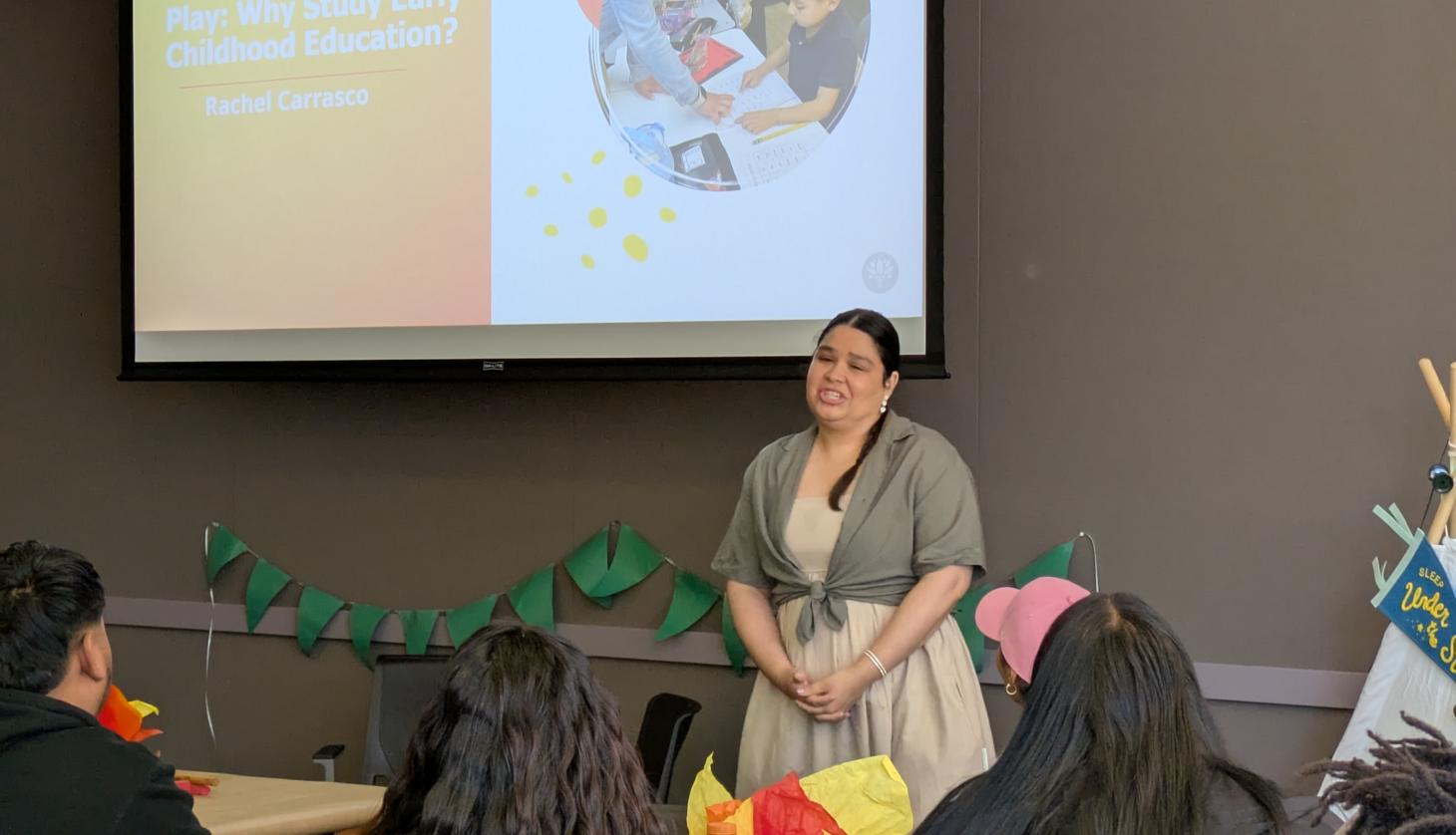 Woman speaks to a group